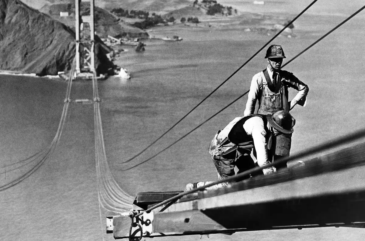 Workers on the Golden Gate Bridge during construction